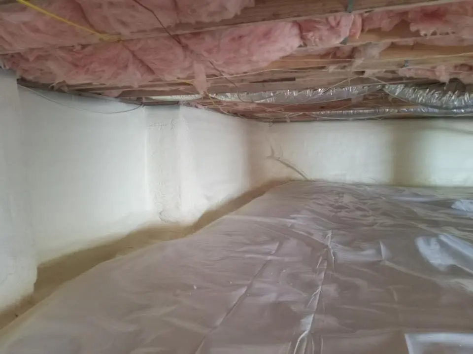 Crawl space encapsulation with closed-cell spray foam for Roof Waterproofing in Winchester